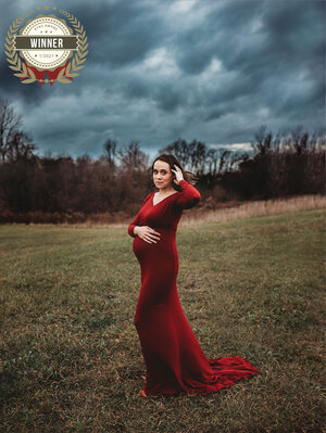 grand rapids maternity photo shoot women in red dress outdoors