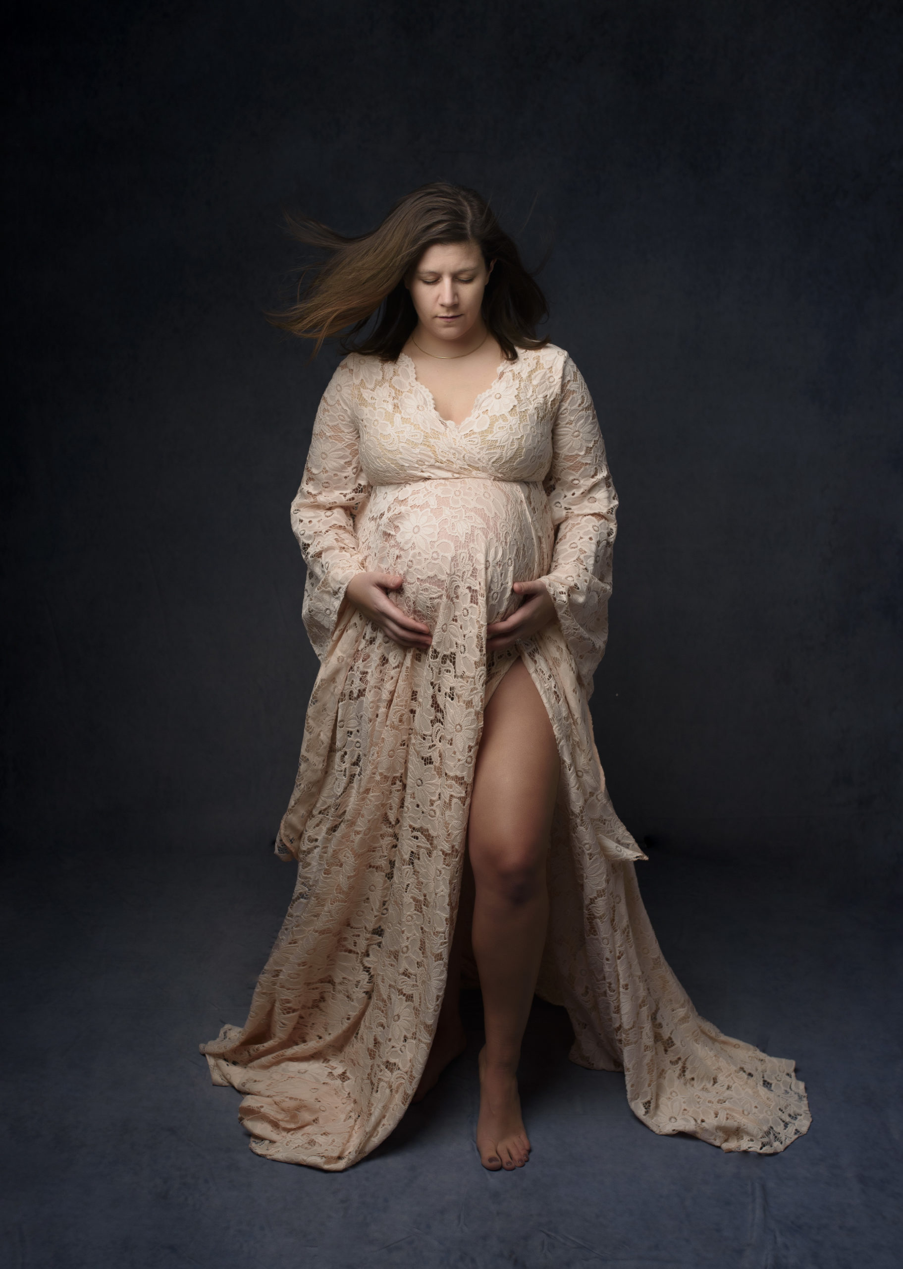 grand rapids maternity photo shoot women in cream dress 