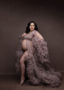 grand rapids maternity photo shoot women in pink gown