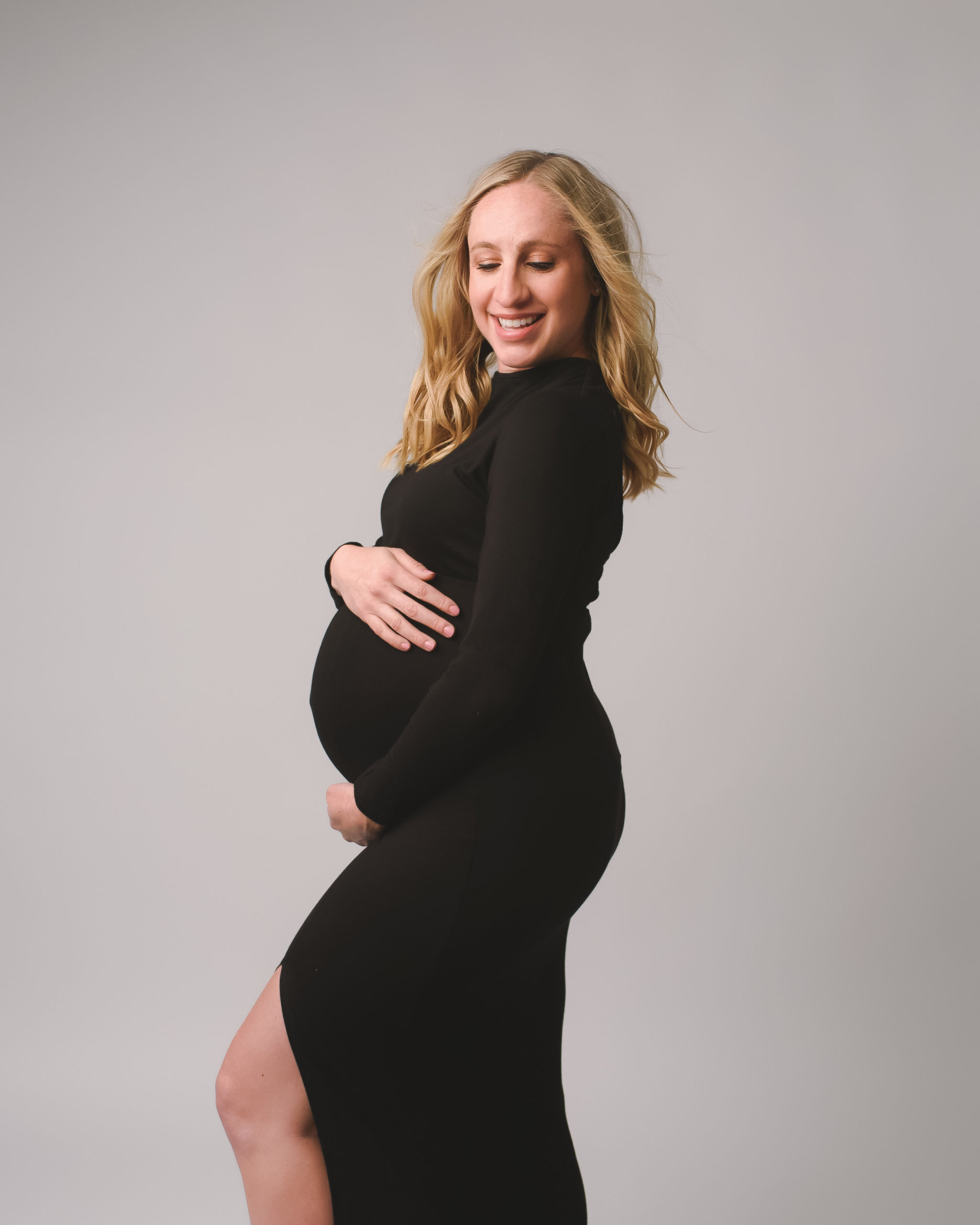 grand rapids michigan maternity fine art shoot mother in black dress