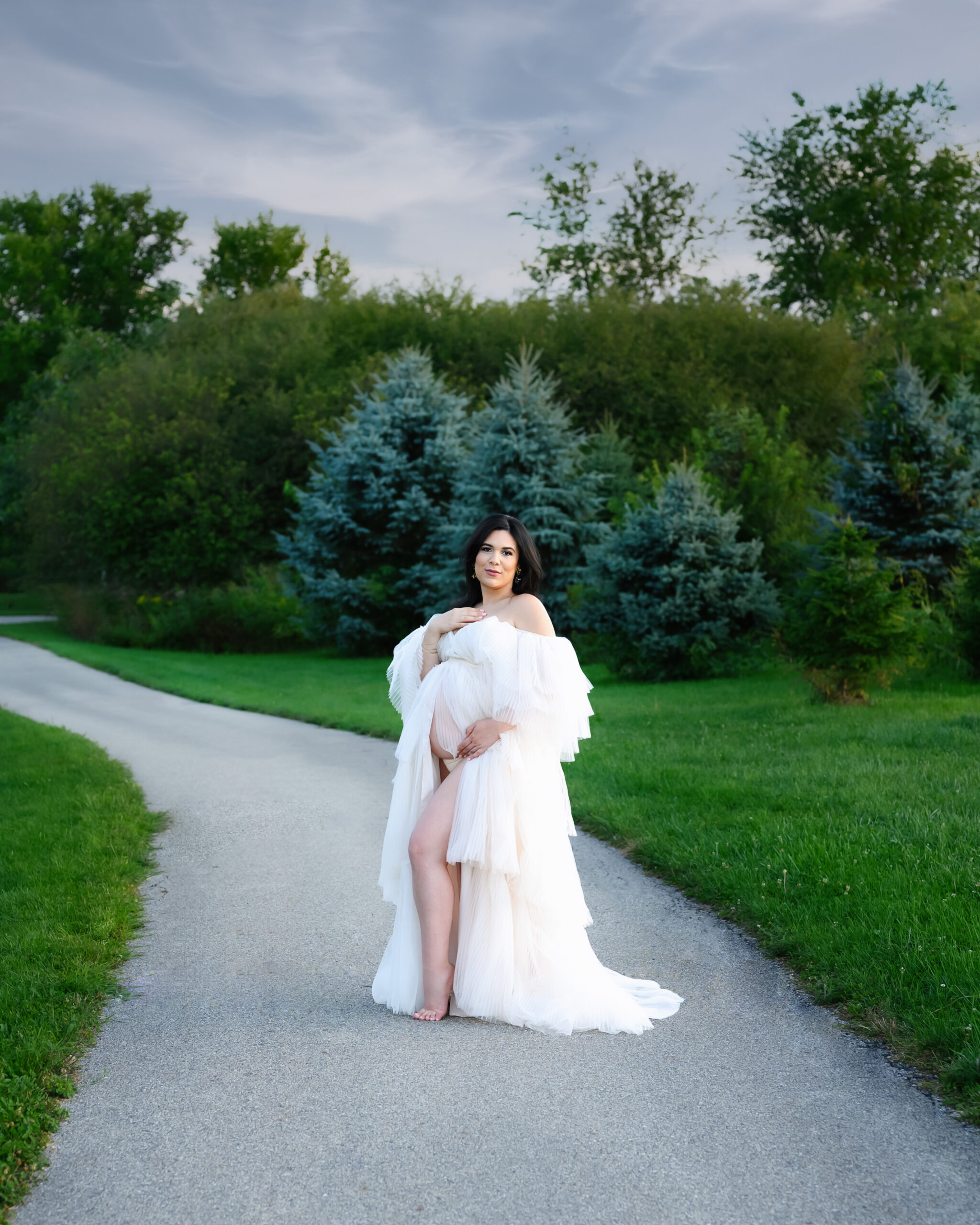 Grand rapids maternity photo session mother in white gown